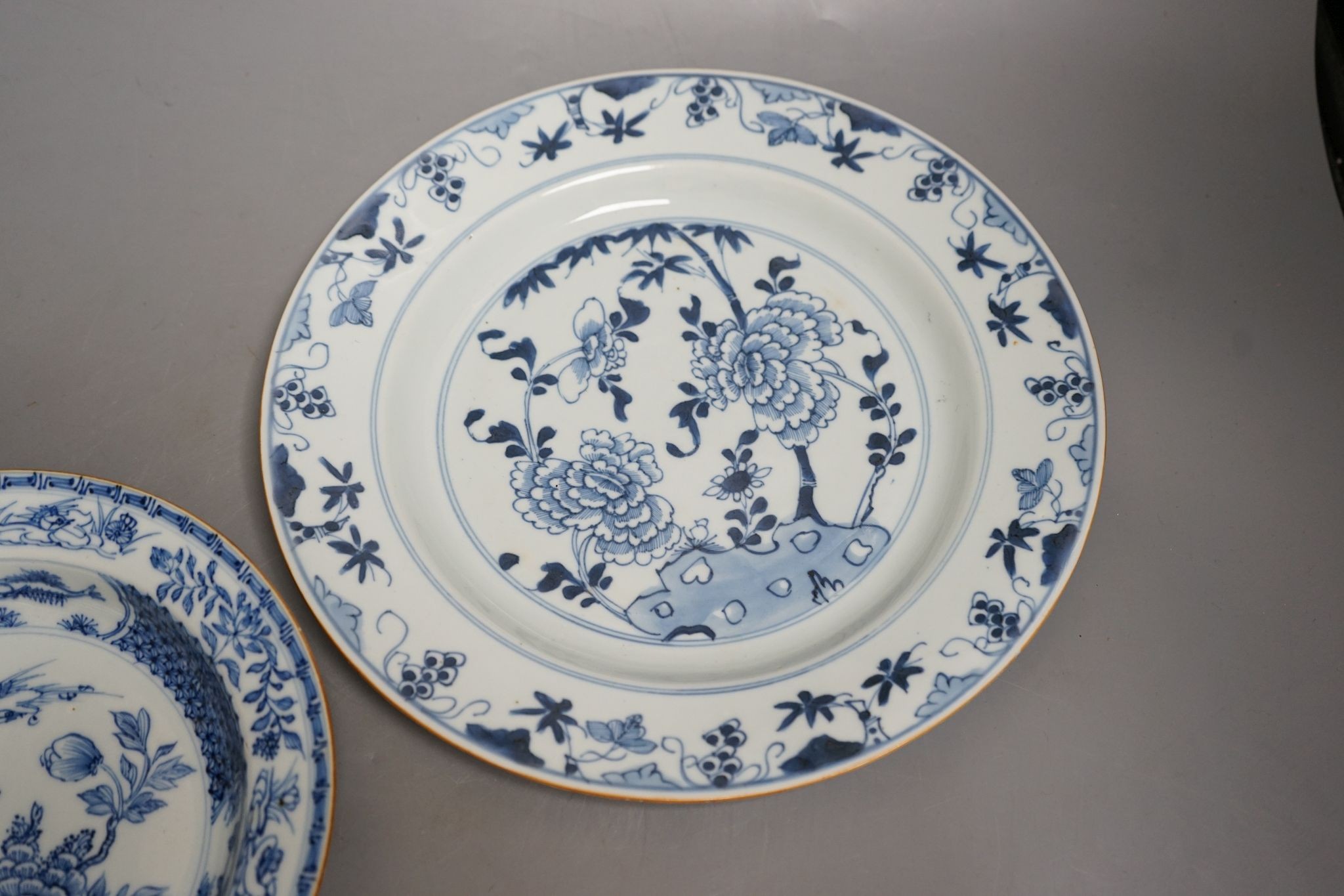 Two 18th century Chinese blue and white plates, largest 29cm diameter